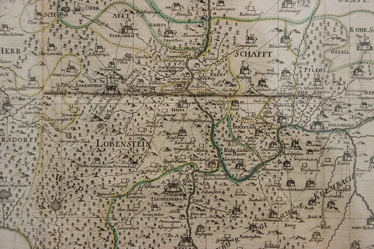 If your character will be visiting specific geography, it's okay to explain that geography in detail.