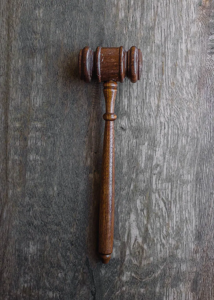 An expert witness testifying before a jury during a trial is a good example of the rhetorical device of ethos