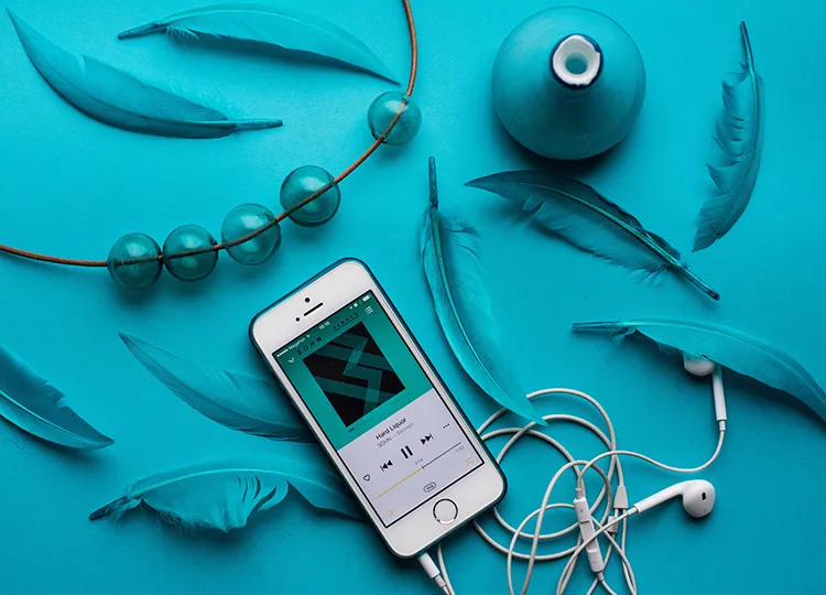 Listening to music can help you visualize scenes and characters from a place of pure creativity.