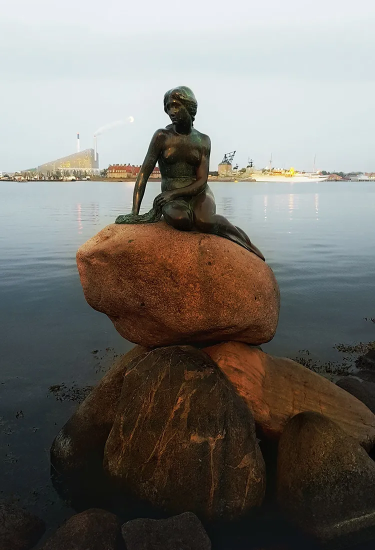 The Little Mermaid, a statue in Copenhagen, Denmark celebrating Hans Christian Anderson's beloved tale.