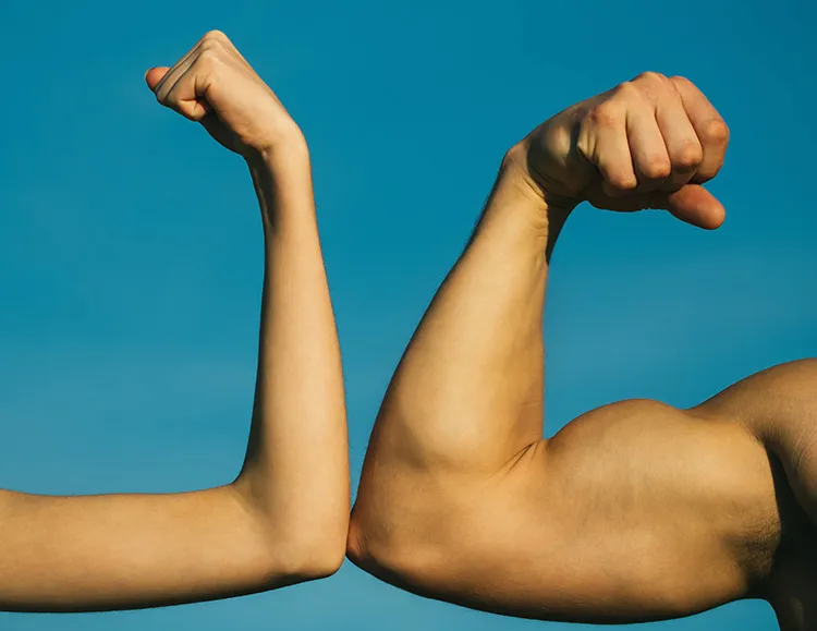 weak versus muscled arm