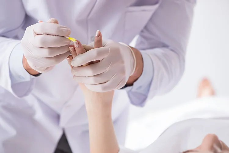 coroner swipes beneath a body's fingernails to collect DNA