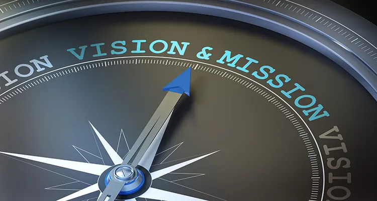 compass with the arrow pointing at vision and mission