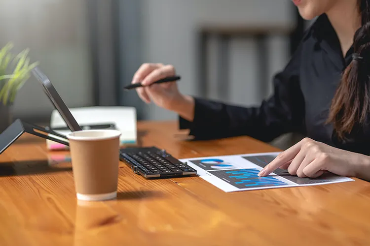 A woman checking a graph