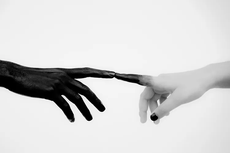Two hands touching