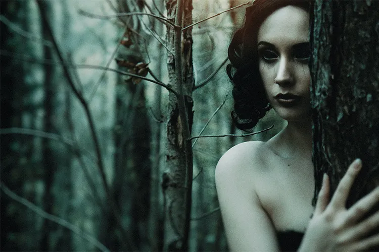 Evil woman in the forest