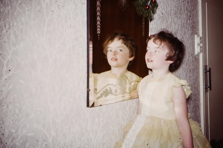 Girl in front of mirror